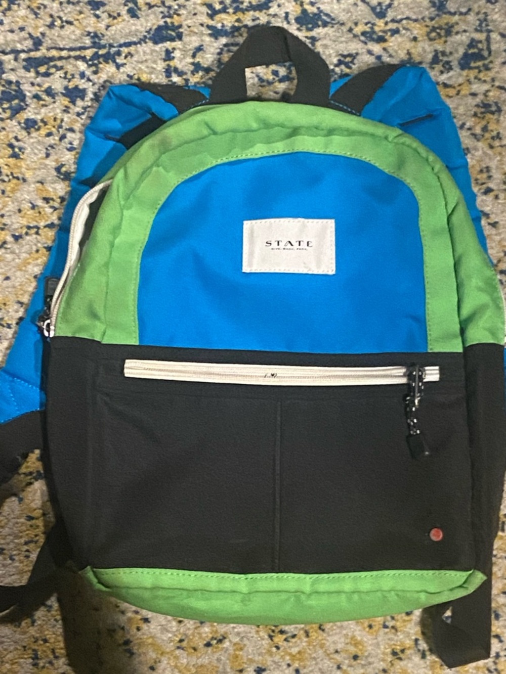 STATE Blue, Green & Black Men’s Backpack with Front Zip Pocket